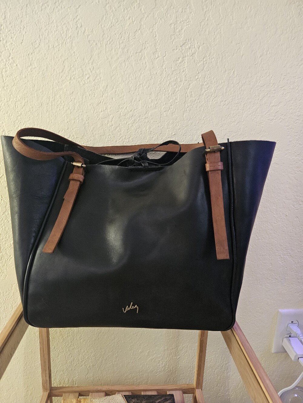 Velez Black Leather Tote Bag with Brown Straps.